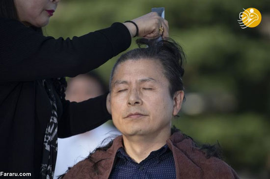 رهبر مخالف کره مو‌های خود را در اعتراض تراشید