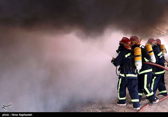 عکس: مانور اطفای حریق زنان آتش نشان