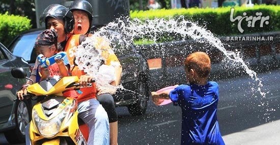 عید جالب آب پاشی در تایلند! + عکس