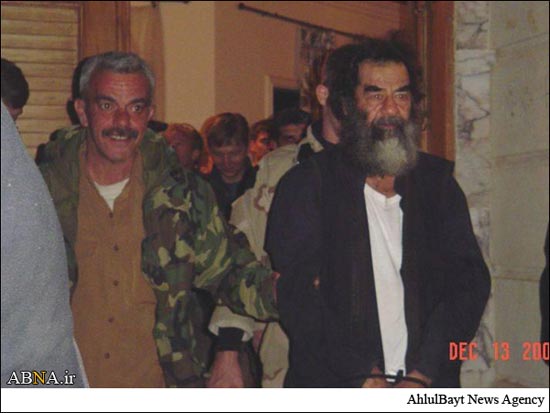عکس روز: لحظه به دام افتادن صدام حسین